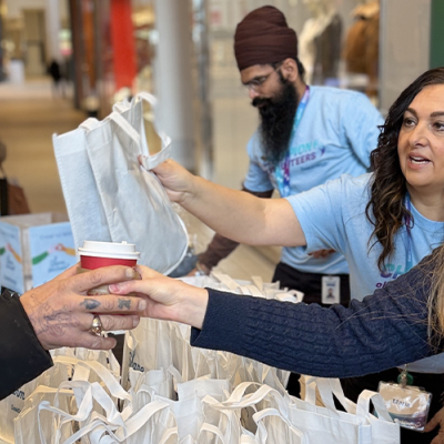 Employee handing out coffee